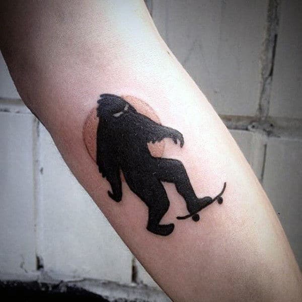 Black Ink Bigfoot Skateboard Tattoos For Guys
