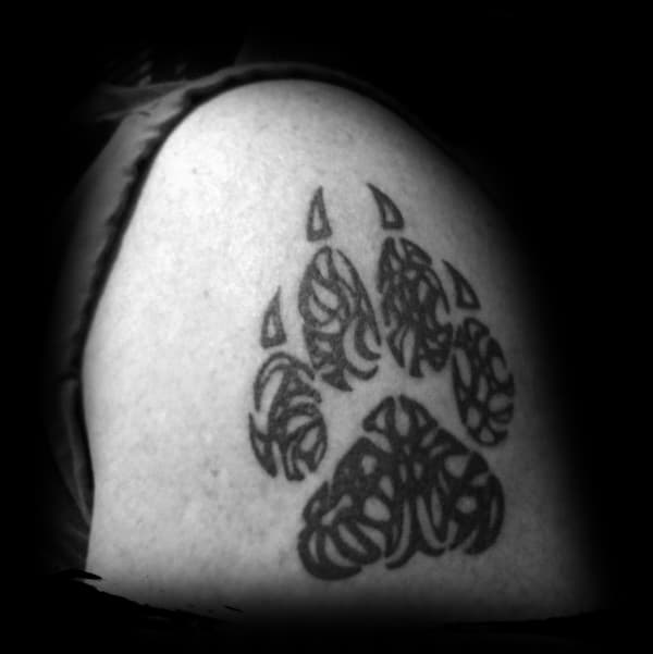 Black Ink Male Wolf Paw Upper Arm Designs For Tattoos