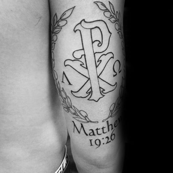 Black Ink Outline Chi Rho Tattoo On Male Back Of Arm