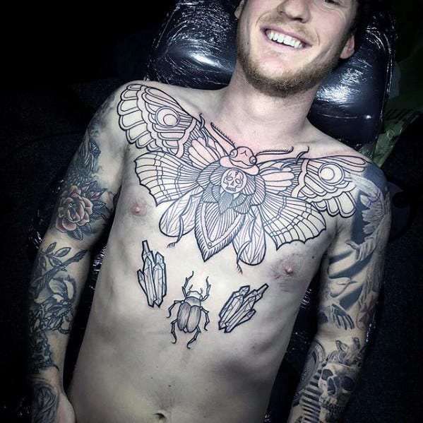 black ink outline mens small scarab chest tattoo ideas