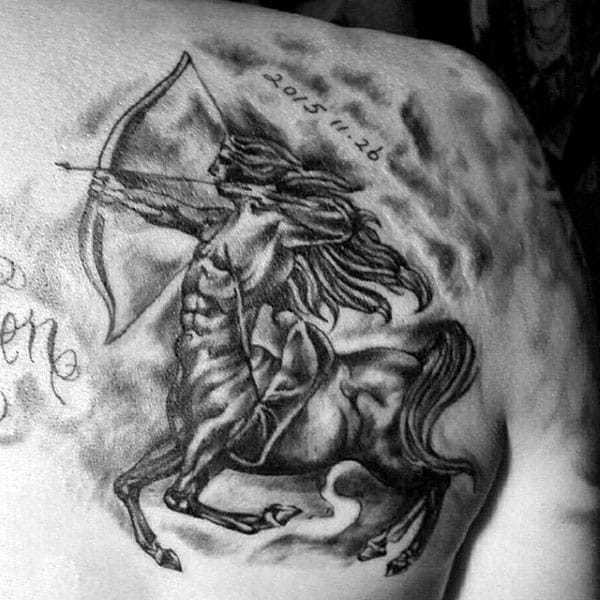 Black Ink Shaded Male Sagittarius Back Tattoo Design Ideas