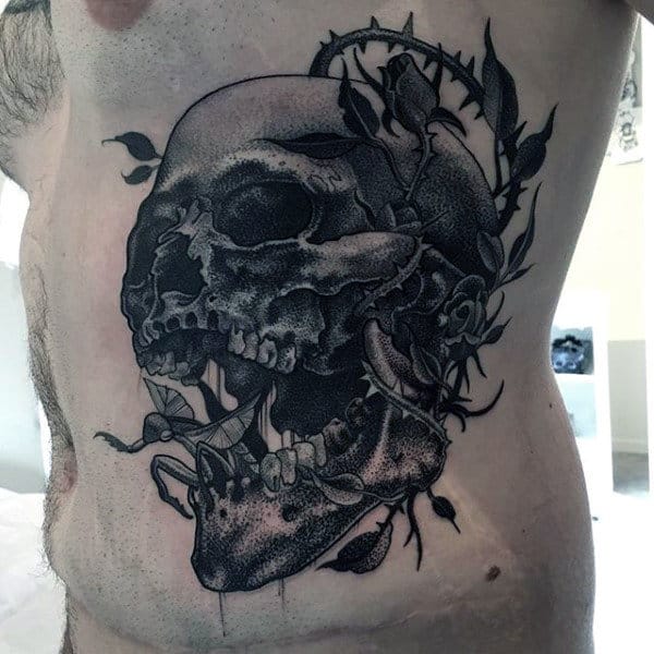Black Ink Shaded Skull Artistic Guys Rib Cage Side Tattoo
