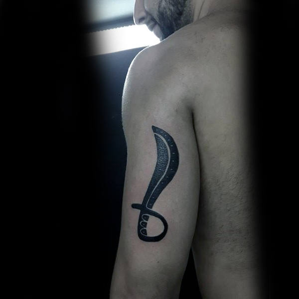 Man with a tattoo of a curved sword on his upper arm