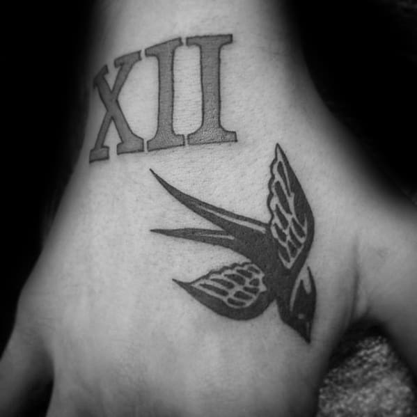 Black Ink Traditional Sparrow Bird Mens Tattoo With Simple Hand Design