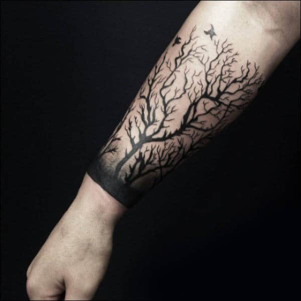 Black Ink Tree Branches Male Forearm Tattoo
