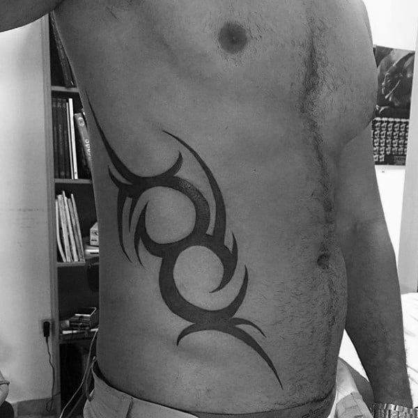 Black Ink Tribal Mens Traditional Ribs Tattoos