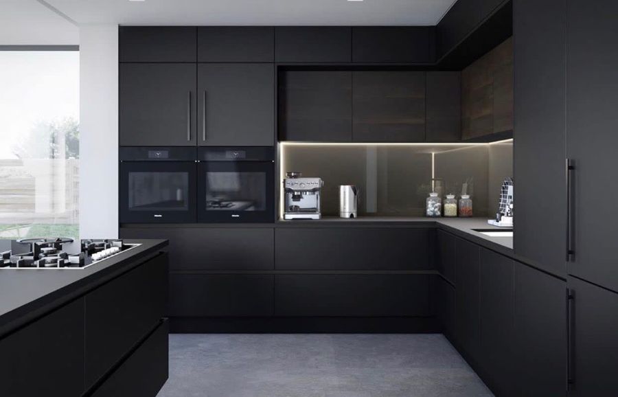 contemporary black kitchen two ovens