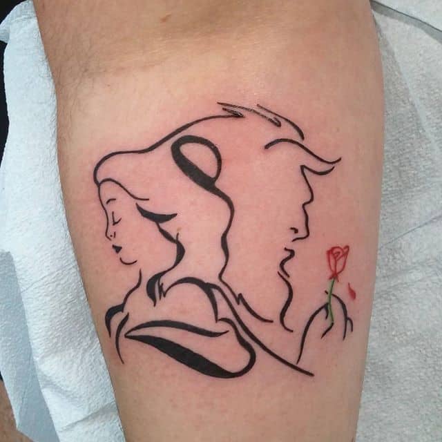 Minimalist line-art tattoo of Belle and the Beast in a flowing silhouette style, with a small red enchanted rose adding a pop of color.