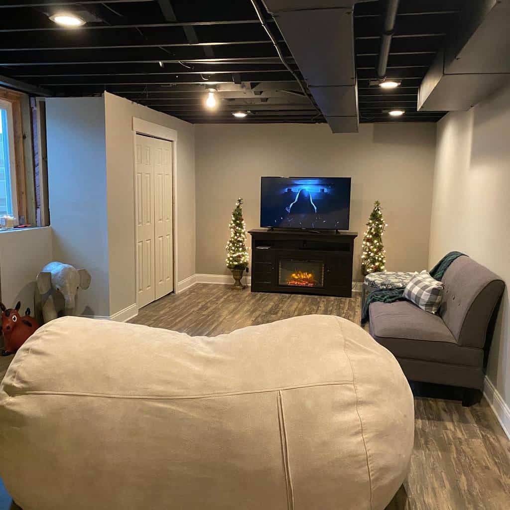 spare basement room with fireplace