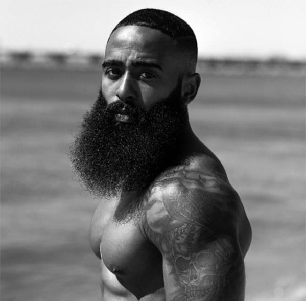 Black Male With Full Length Beard Style And Short Haircut