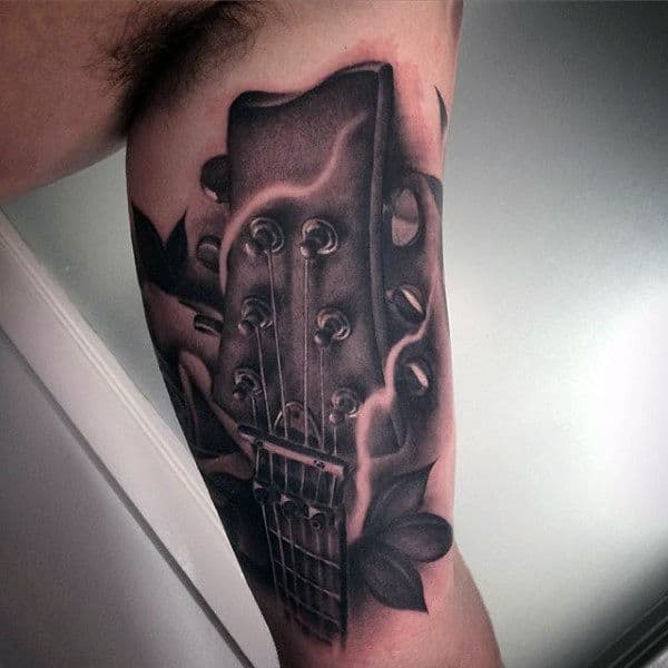 Black Shaded Guitar Head Tattoo For Men On Inner Arms