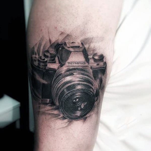 Black Sketch Of Olympus Camera Tattoo Male Arms