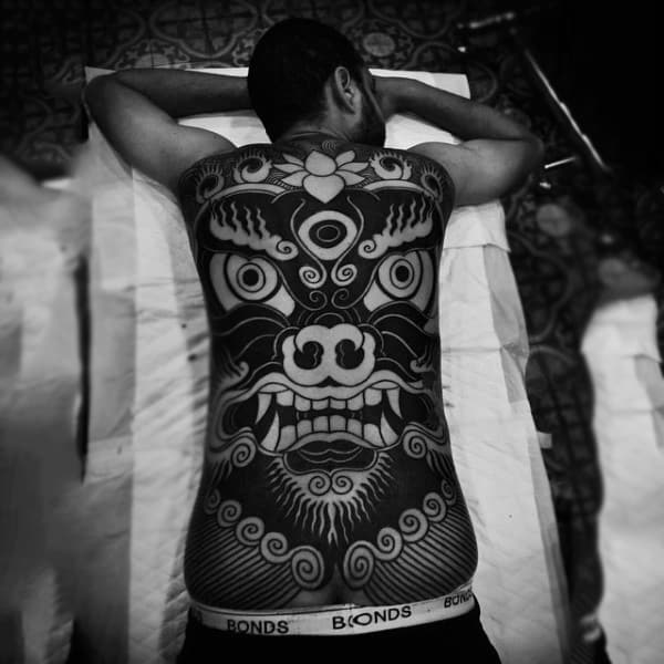 Black Tribal Large Eyed Face Tattoo Mens Full Back