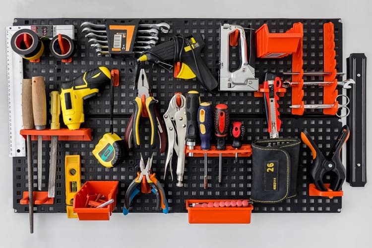 black wall workshop garage pegboard ideas