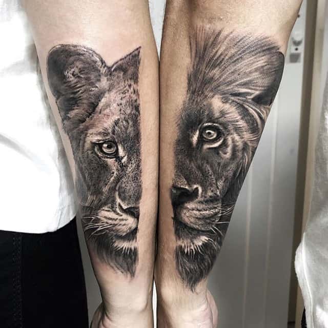 Matching black and grey forearm tattoos of a lioness and lion, each featuring hyper-realistic shading and detailed fur for a striking design.