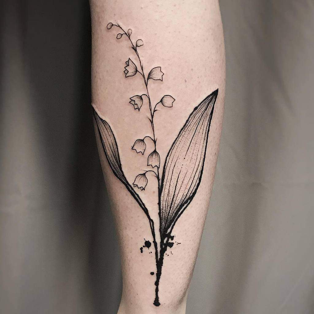 Minimalist black ink Lily of the Valley tattoo with fine lines and subtle shading, featuring delicate flowers and bold leaves