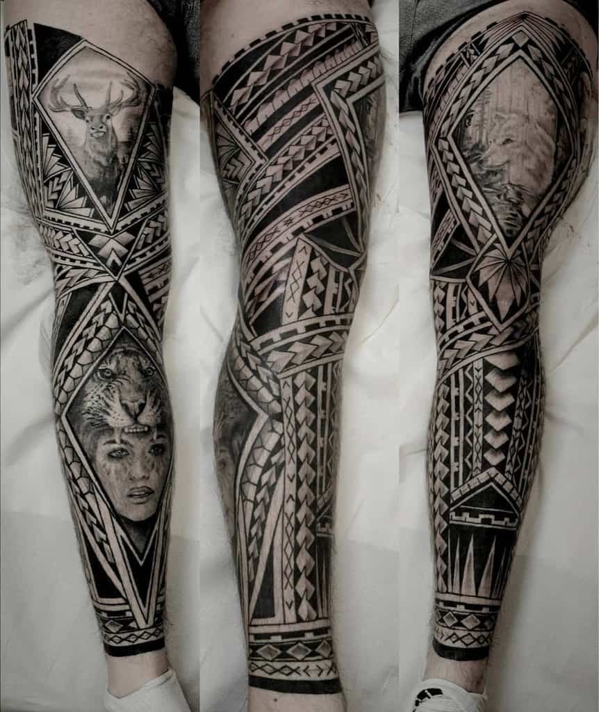 Detailed tribal leg sleeve tattoo with geometric patterns, featuring animal portraits of a deer, lion, and a woman’s face