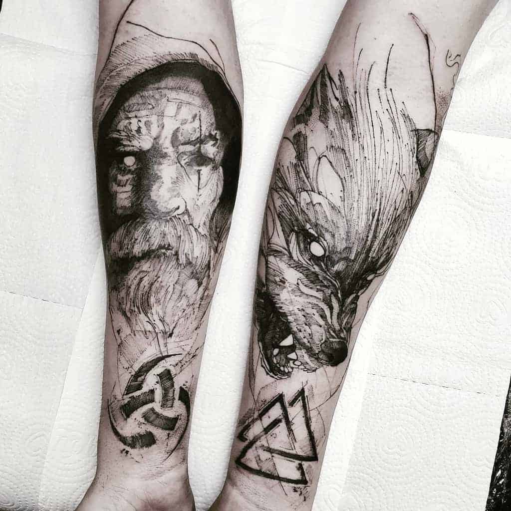 Norse-themed blackwork tattoo on both forearms, depicting an aged figure with a runic symbol on one arm and a fierce wolf with glowing eyes on the other