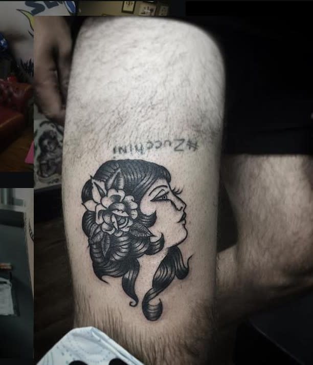 Tattoo of a gypsy woman's face with floral hair gracefully adorning a man's thigh