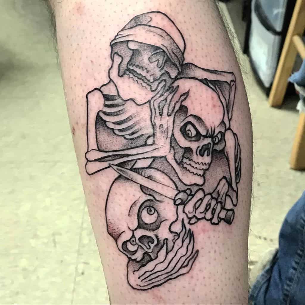 Blackwork tattoo of three skeletons embodying 'Hear No Evil, See No Evil, Speak No Evil,' with bold shading and detail