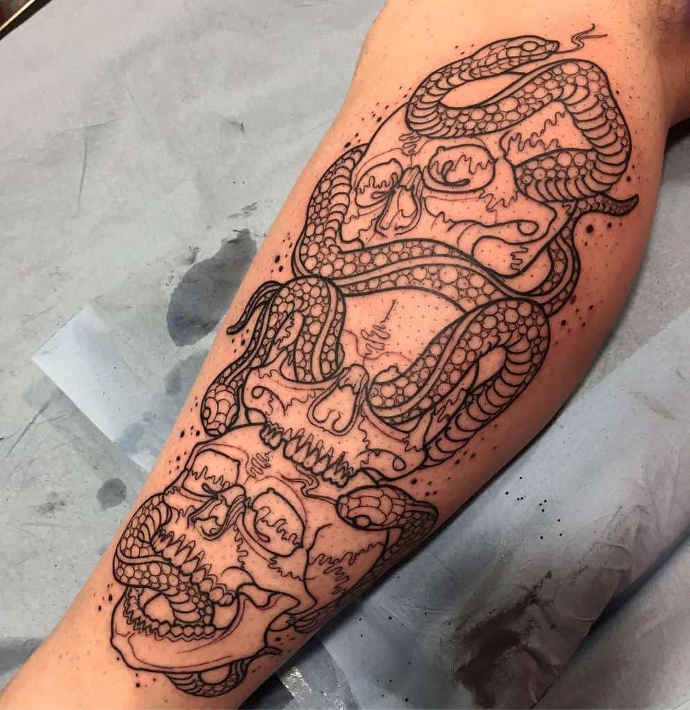 Detailed blackwork tattoo of three skulls entwined with snakes, symbolizing 'Hear No Evil, See No Evil, Speak No Evil'