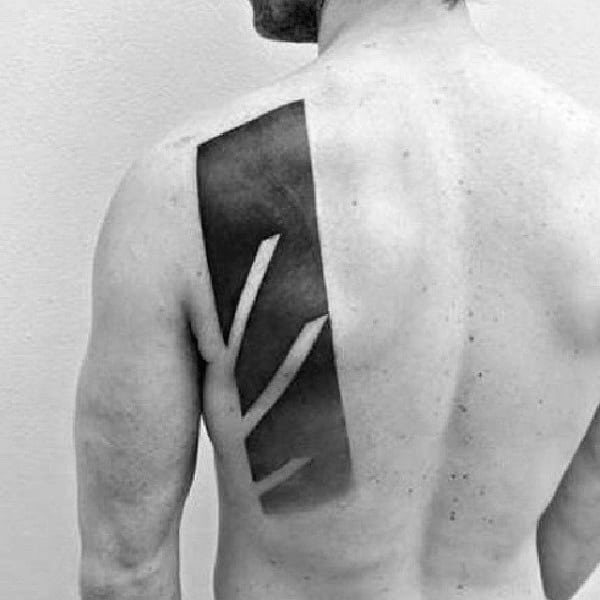 Back tattoo featuring an abstract geometric design with bold black shading
