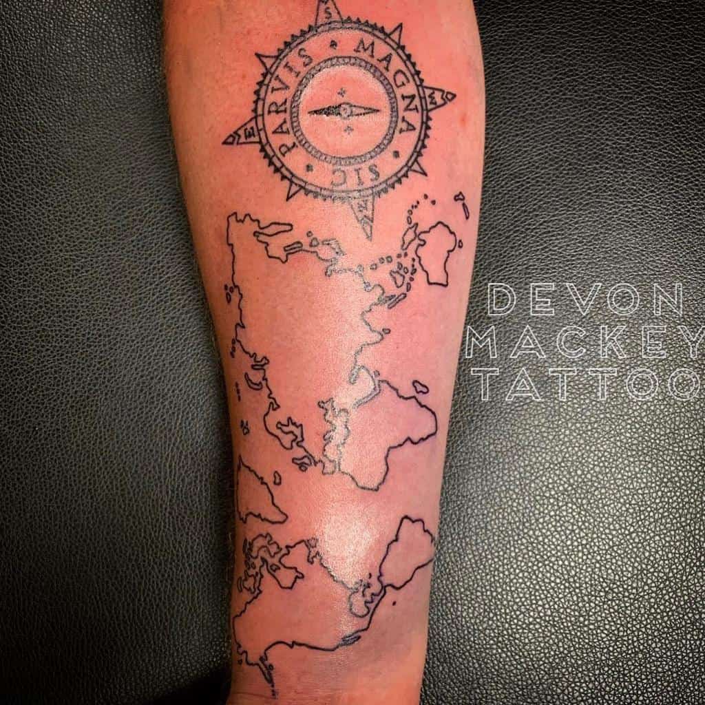 Forearm tattoo with a compass labeled 'Sic Parvis Magna' above an outlined world map in a minimalist blackwork style