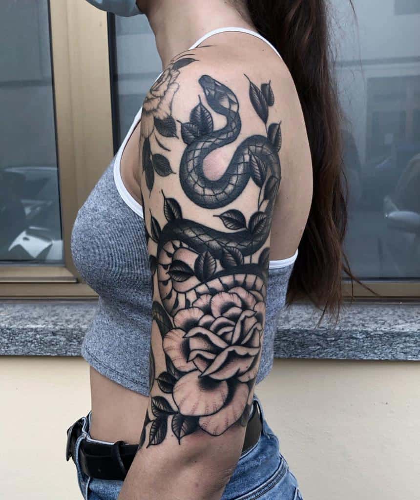 blackwork snake arm tattoo zanca_tattooer