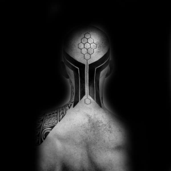 Back tattoo featuring geometric and hexagonal patterns