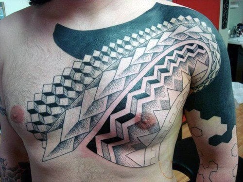 Blackwork With Polynesian Theme Mens Tattoo On Chest And Upper Arm