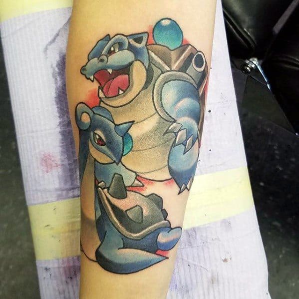 Bold Blastoise and graceful Lapras tattoo, showing two powerful water-type Pokémon in a clean, colorful forearm design.