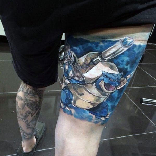 Realistic Blastoise thigh tattoo with intense water effects and a powerful pose, emphasizing strength and dynamic movement.