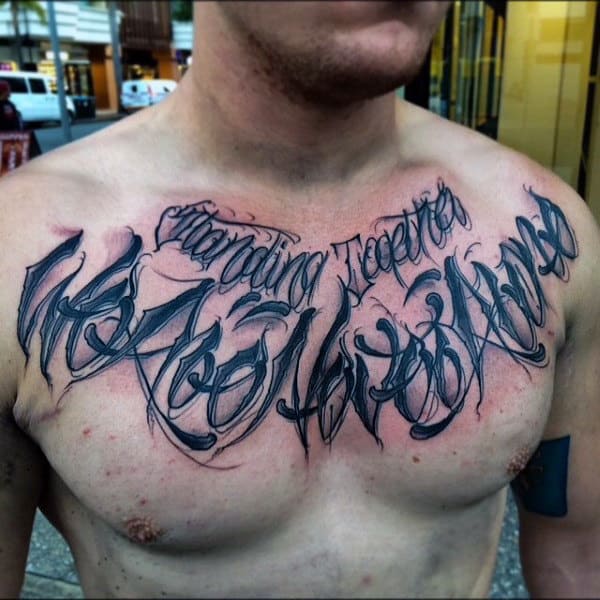 Bloody Black Lettering Tattoo Male Chest Inspiration
