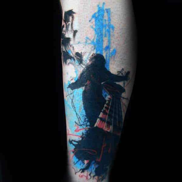 Blue And Black Ink Guys Trash Polka Tattoo On Leg