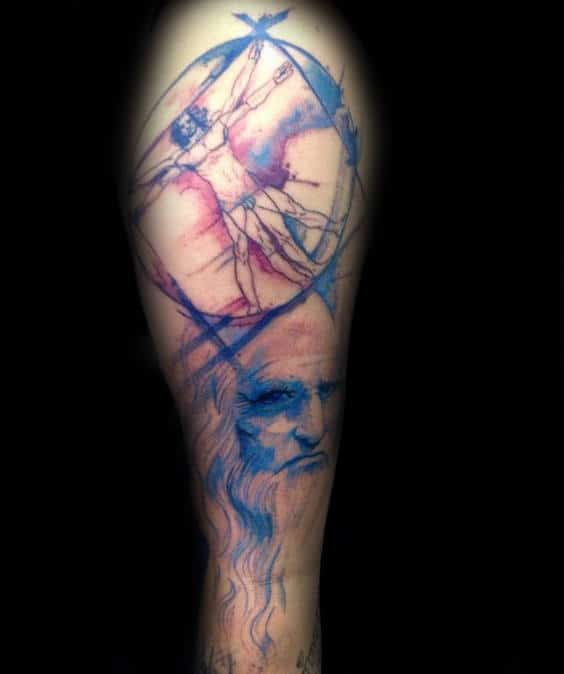 Blue And Red Vitruvian Man Male Tattoo With Leonardo Da Vinci Portrait Design On Arm