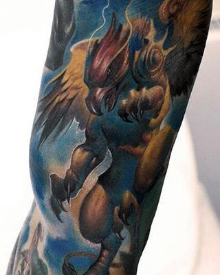Blue And Yellow Griffin Sleeve Guys Tattoo Design Ideas
