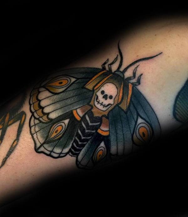 Blue And Yellow Guys Moth Arm Tattoos