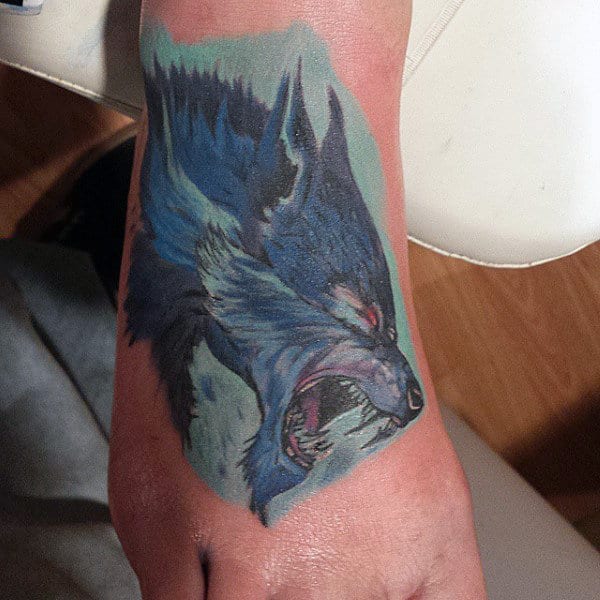 Blue Colored Werwolf Tattoo Profile View On Mens Hands