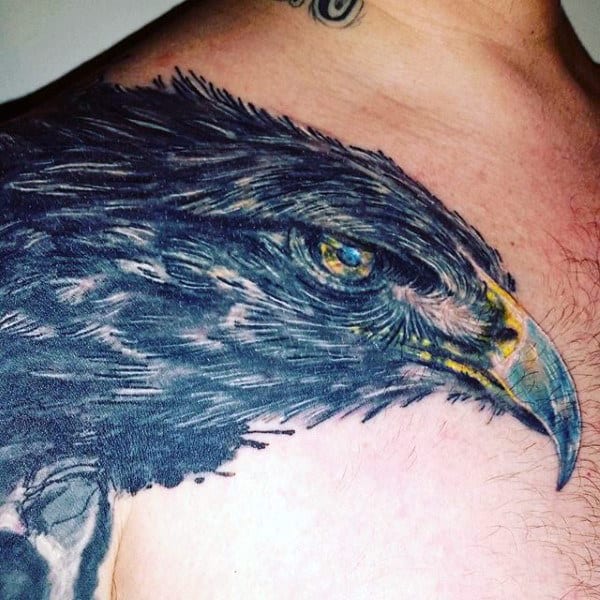 Blue Guy's Eagle Tattoo On Shoulder