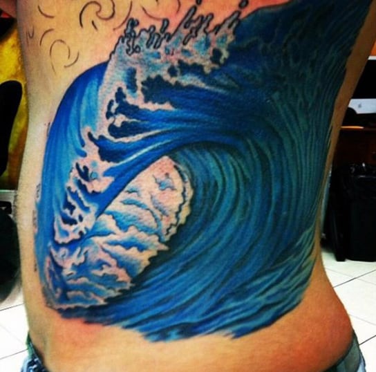 Blue Guy's Hokusai Wave Tattoo On Ribs