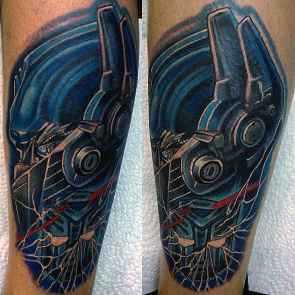 Blue Ink Mens Transformers Tattoo Design On Leg
