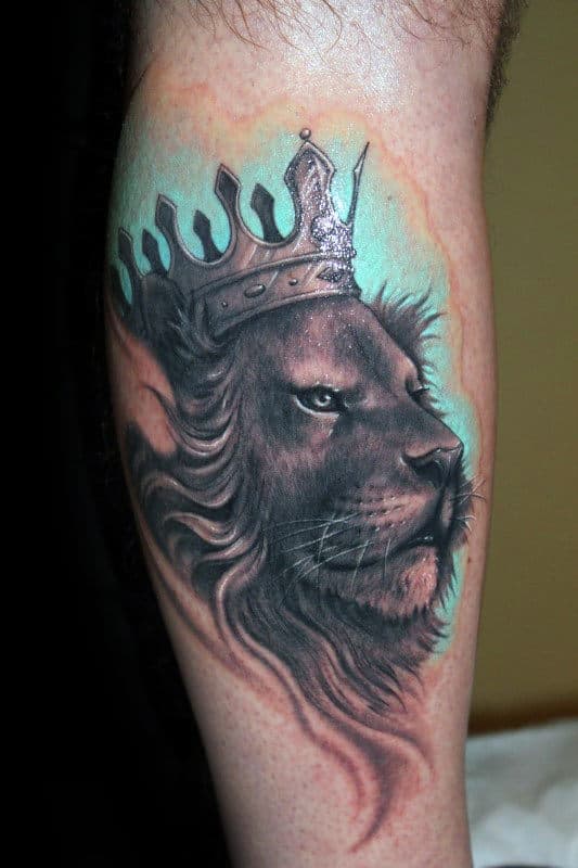 Blue Watercolor Lion With Crown Guys Leg Calf Tattoos