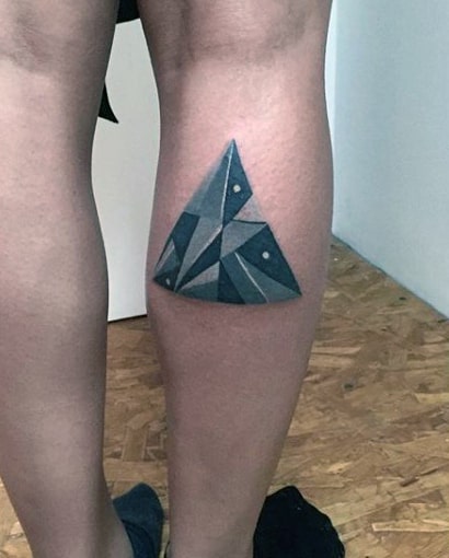 Bluish Pointed Traingular Design Tattoo On Calves
