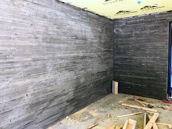 unfinished gray garage wall 