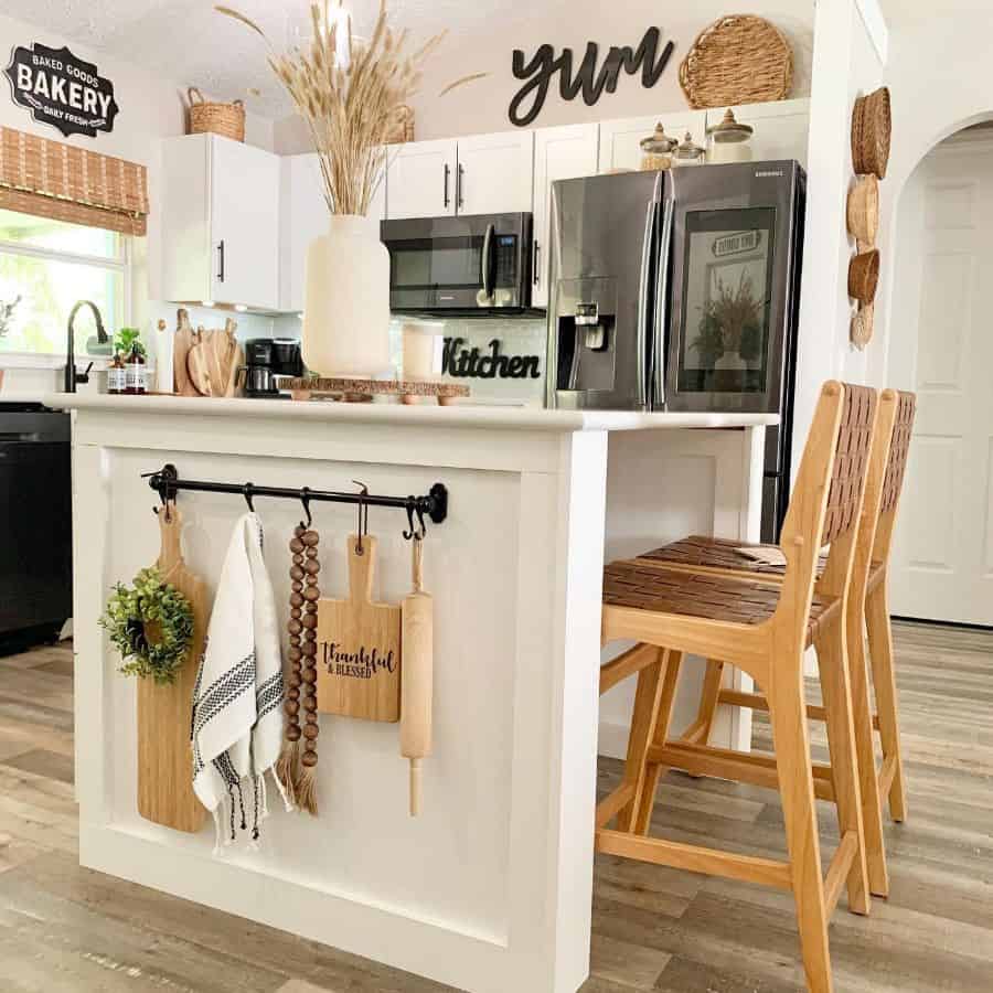 stylish country kitchen white cabinets two wood seats small island
