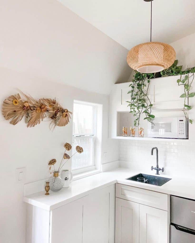 simple white kitchen recessed shelf with mircrowave