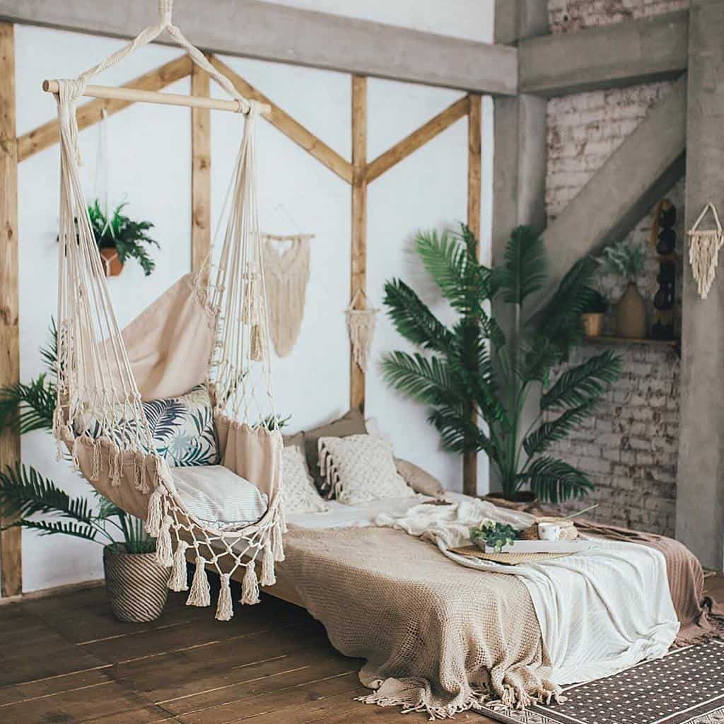 rustic boho bedroom with hammock seating
