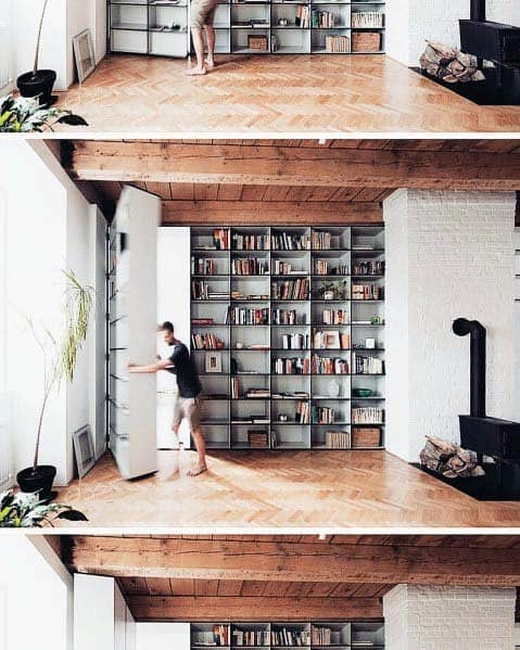 large hidden door bookcase fireplace wood roof