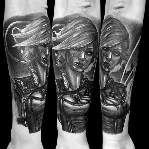 Realistic black and grey tattoo of Lilith from Borderlands, showcasing detailed shading, intense expression, and dynamic hair movement.