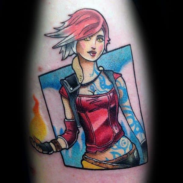 Colorful tattoo of Lilith from Borderlands in a comic book style, with bright red hair, glowing fireball, and bold blue background frame.